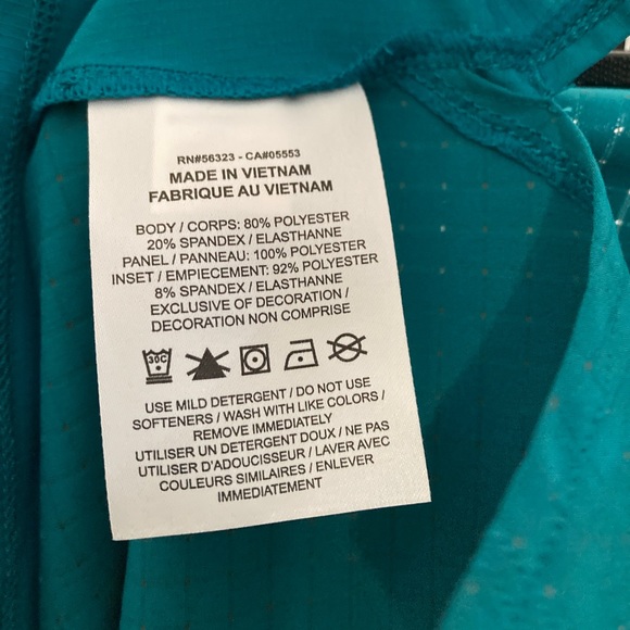 🔥🔥NWT Nike Trail Rise Reflective Teal Top - Picture 4 of 7